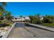 Concrete boat ramp leads to canal with waterfront homes and lush greenery, promising easy access for boating enthusiasts at 2007 Yale Ave, Bradenton, FL 34207