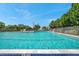 Community swimming pool with bright blue water, set in a fenced area at 2007 Yale Ave, Bradenton, FL 34207