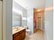 Neutral bathroom featuring a vanity sink, toilet, and shower/tub combo at 20330 Natures Corner Dr, Tampa, FL 33647