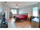 Neutral bedroom with tile flooring and a large window at 20330 Natures Corner Dr, Tampa, FL 33647