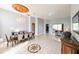 Open-concept dining room featuring decorative lighting and spacious layout at 20330 Natures Corner Dr, Tampa, FL 33647