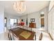 Open-concept dining room featuring decorative lighting and spacious layout at 20330 Natures Corner Dr, Tampa, FL 33647