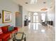 Spacious living room with high ceilings, archways, and tile floors at 20330 Natures Corner Dr, Tampa, FL 33647