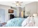 Spacious bedroom with vaulted ceiling, television, and calming color scheme at 2352 Lake Woodberry Cir, Brandon, FL 33510