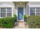 A well-maintained front door adorned with a wreath at 2352 Lake Woodberry Cir, Brandon, FL 33510