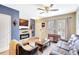 A comfortable living room featuring a fireplace and a sofa at 2352 Lake Woodberry Cir, Brandon, FL 33510