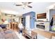 A living room and dining area with hardwood floors and comfortable furniture at 2352 Lake Woodberry Cir, Brandon, FL 33510