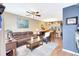 A living room and dining area with hardwood floors and comfortable furniture at 2352 Lake Woodberry Cir, Brandon, FL 33510