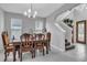 Elegant dining room features a beautiful table set at 29011 Trevi Pl, Wesley Chapel, FL 33543
