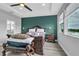 Comfortable main bedroom featuring a bench at 29011 Trevi Pl, Wesley Chapel, FL 33543