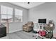 Cozy office with natural light coming in from two large windows at 29011 Trevi Pl, Wesley Chapel, FL 33543