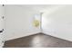 Bright bedroom with hardwood floors and a window bringing in natural light at 3201 S Manhattan Ave, Tampa, FL 33629