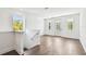 Bright upstairs hallway with a view of the exterior at 3201 S Manhattan Ave, Tampa, FL 33629