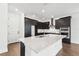 Kitchen featuring a large island, stainless steel appliances and a white countertop at 3201 S Manhattan Ave, Tampa, FL 33629