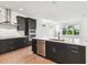 Bright kitchen with a large island, stainless steel appliances, and lots of natural light at 3201 S Manhattan Ave, Tampa, FL 33629