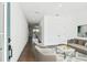 Bright living room featuring hardwood floors, neutral paint, and modern furnishings at 3201 S Manhattan Ave, Tampa, FL 33629