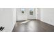 Light-filled room features hardwood floors and neutral walls at 3201 S Manhattan Ave, Tampa, FL 33629
