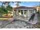 Beautiful home showcasing a covered front porch, a well-kept exterior, and inviting curb appeal at 3711 1St S Ave, St Petersburg, FL 33711
