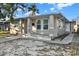 Charming single-story home featuring a welcoming front porch, well-maintained landscaping, and a classic design at 3711 1St S Ave, St Petersburg, FL 33711