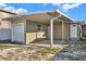 This house features a detached garage and carport with extra room for storage and parking at 3711 1St S Ave, St Petersburg, FL 33711