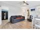 An open-concept living room and dining area offers comfortable seating and tile flooring at 3711 1St S Ave, St Petersburg, FL 33711