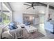 Bright living room featuring modern decor, neutral color palette, and ample natural light at 3820 E Lakeshore Dr, Tampa, FL 33604