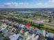 Aerial view highlighting the home's location in a neighborhood with beautiful lakes in the backdrop at 410 Manns Harbor Dr, Apollo Beach, FL 33572