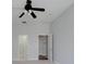 Bedroom with a ceiling fan, closet, and neutral walls at 410 Manns Harbor Dr, Apollo Beach, FL 33572