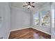 Bedroom featuring hardwood floors, two large windows and neutral walls at 410 Manns Harbor Dr, Apollo Beach, FL 33572