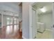 Hallway view of laundry room with washer and dryer at 410 Manns Harbor Dr, Apollo Beach, FL 33572