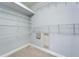 A walk-in closet features adjustable wire shelving for organized storage space at 410 Manns Harbor Dr, Apollo Beach, FL 33572