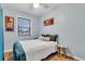 Bedroom with modern interior decor, wood-look floors, and natural light at 4200 Bluefish Se Dr, St Petersburg, FL 33705