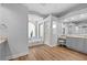 Bright bathroom with large tub, marble details, glass enclosed shower and vanity at 5204 Avenue La Crosse, Lutz, FL 33558
