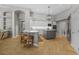 Spacious kitchen with island seating, modern appliances, and herringbone floors at 5204 Avenue La Crosse, Lutz, FL 33558