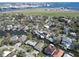 Aerial view of waterfront homes with canal access and views of Tampa's port at 547 Suwanee Cir, Tampa, FL 33606