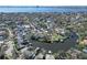Picturesque waterfront neighborhood boasting lush landscaping, private docks, and serene water views at 547 Suwanee Cir, Tampa, FL 33606