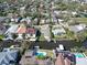 Picturesque aerial view of waterfront homes with private docks and stunning water views at 547 Suwanee Cir, Tampa, FL 33606