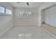 Bedroom with carpeted nook and shuttered windows with access to adjoining rooms at 547 Suwanee Cir, Tampa, FL 33606