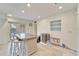 Kitchen featuring a large island, stainless steel appliances, and open access to a patio area at 547 Suwanee Cir, Tampa, FL 33606