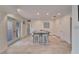 Bright kitchen area featuring tile flooring, recessed lights, a center island with seating at 547 Suwanee Cir, Tampa, FL 33606