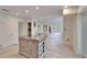 Spacious kitchen area with a central island and recessed lighting, open to the living area at 547 Suwanee Cir, Tampa, FL 33606
