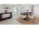 Modern dining room with pool views, console table, and a minimalist aesthetic at 5932 Red Mangrove Ln, Bradenton, FL 34210