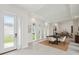 Bright foyer leading to the dining and living room areas with lots of natural light at 5932 Red Mangrove Ln, Bradenton, FL 34210