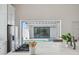 Elegant kitchen featuring a pass-through window offering stunning pool views, blending indoor and outdoor living seamlessly at 5932 Red Mangrove Ln, Bradenton, FL 34210