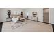 Spacious main bedroom featuring a decorative rug, ensuite bathroom access, and a walk-in closet at 5932 Red Mangrove Ln, Bradenton, FL 34210