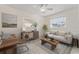 Bright living room with neutral tones, lots of natural light, comfortable seating, and stylish decor at 6648 12Th N Ave, St Petersburg, FL 33710