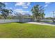 Manicured front yard with a view of the charming home and its welcoming entrance at 8025 N Gomez Ave, Tampa, FL 33614