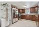 Gourmet kitchen features stainless steel appliances, sleek granite countertops, and ample cabinet space at 8025 N Gomez Ave, Tampa, FL 33614