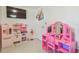 playroom featuring toy kitchen, vanity and playful decor at 8025 N Gomez Ave, Tampa, FL 33614