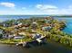 Waterfront estate with a private dock and scenic water views, perfect for boating enthusiasts and relaxing by the water at 101 Augusta Ave, Palm Harbor, FL 34683